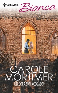Un corazón acosado - Carole Mortimer - E-Book